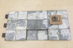 Detail of stell objects on the floor with frame