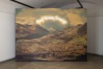 historical painting, showing a landscape with mountains in a sunset with military buildings at the bottom. Above the landscape there is a neon sign that says "Don't Dream Dreams"