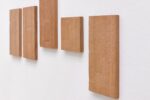 Photo of the exhibition at Kunstpavillon with detail of wooden panels
